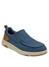 zapatilla slip-on azul con detalles clásicos y suela beige estilosa