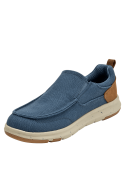 zapatilla azul de hombre con diseño slip-on y parche tipo cuero en el talón