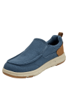 zapatilla azul de hombre con diseño slip-on y parche tipo cuero en el talón