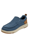 zapatilla azul de hombre con diseño slip-on y parche tipo cuero en el talón
