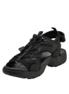 sandalia negra de cuero para hombre con correas ajustables y detalles de malla para ventilación y adaptabilidad.