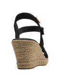 Calzado casual femenino en cuero negro con detalles texturizados y cuña recubierta de yute.