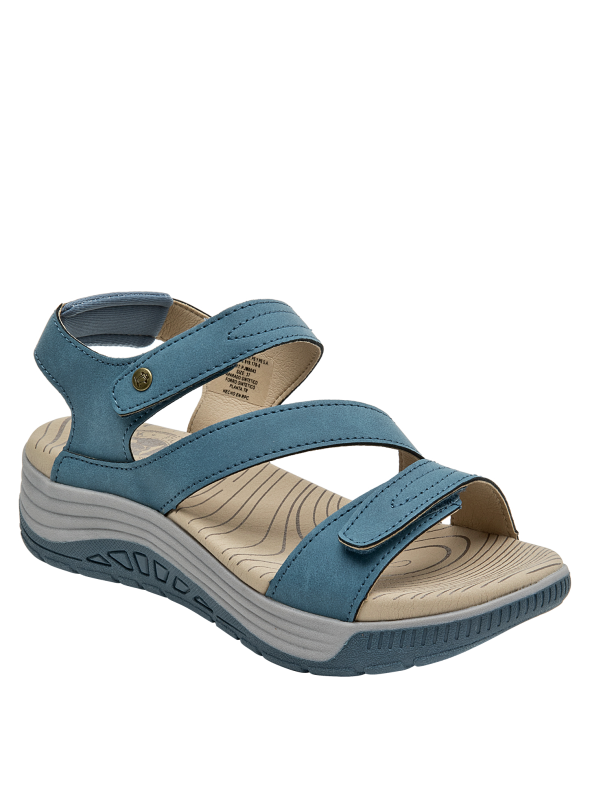 Calzado casual azul con tiras de velcro y suela resistente, ideal para el día a día.