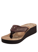 Sandalia casual de mujer en tono marrón suave con tejido trenzado textil y base de corcho estampada.