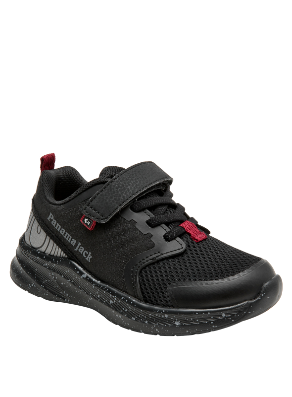 Calzado negro infantil con suela dinámica y detalles en rojo, combina con prendas casuales.
