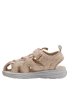 Sandalia infantil beige con diseño floral, perfecta para paseos al parque y eventos al aire libre.