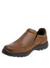 Calzado masculino marrón de cuero, suela de goma negra robusta y costuras decorativas.