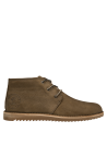 Botín de cuero taupe masculino, diseño rústico y sofisticado para uso diario.