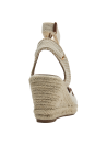 Alpargata textil beige con cierre moderno, perfecta para eventos informales diurnos.