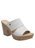 Sandalia mule de cuero blanco, diseño moderno y sofisticado, perfecta para salidas informales y look de oficina relajado.