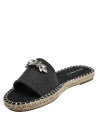 Alpargata negra de mujer con pedrería, diseño elegante y contemporáneo.