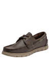 Zapato casual de cuero marrón oscuro con suela de goma beige antideslizante y costura artesanal.