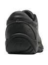 Zapato negro de cuero para hombre, estilo casual, con cordones y perforaciones laterales.