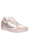 zapatilla minimalista de cuero blanco para mujer, ideal para combinar con jeans o falda