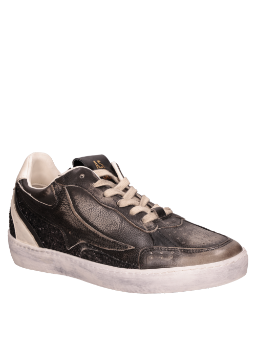 Zapatilla de cuero negro para mujer, resistente y adecuada para el día a día.