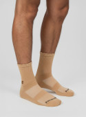 Calcetines unisex camel de mezcla algodón, poliéster y elastano, ideales para uso diario.