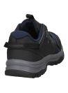 Zapatilla de trekking unisex azul, con suela ULTRACTION para excelente agarre en superficies irregulares.