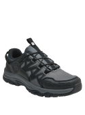Zapatilla de trekking gris unisex, confeccionada con material sintético resistente al agua.