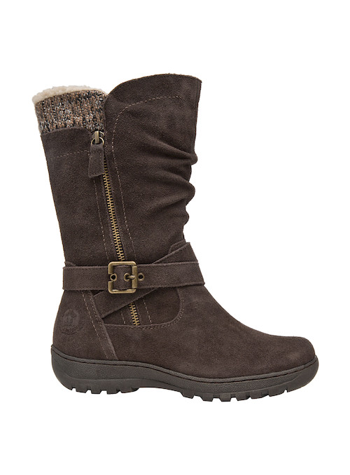 Elegante bota de cuero color moro para mujer, con estilo rústico refinado y punta redonda, ideal para combinar con jeans.