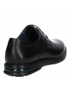 Calzado casual de cuero negro para hombre, diseño derby con taco plano.