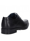 Zapato negro de cuero para hombre con protección interior preformada.