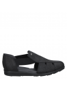 Sandalia de cuero negro para mujer, estilo casual, ideal para el confort.