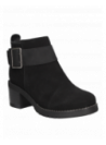 Botín negro informal para mujer, diseño fresco y moderno, adecuado para diversas ocasiones.