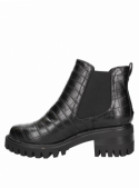 Botín negro de mujer estilo Chelsea, altura de caña de 13 cm, ideal para looks trendy.