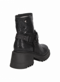 Botín de cuero negro para mujer, caña de 17 cm, ideal para un estilo vanguardista e informal.